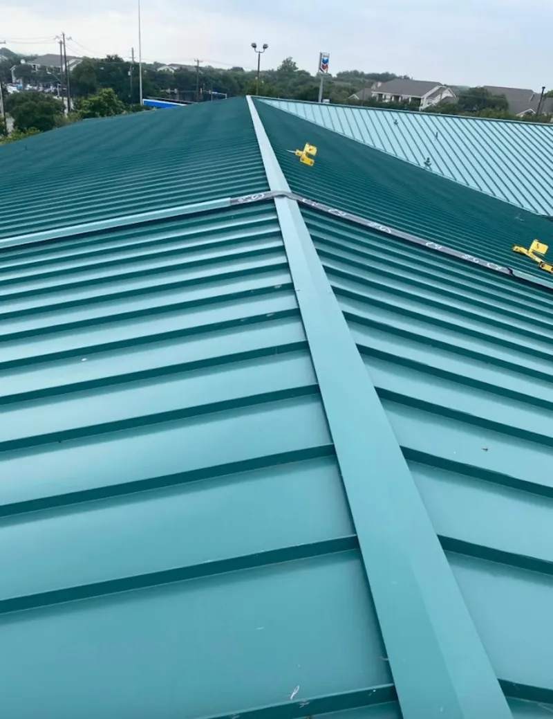 Green commercial metal roof ridge and valley for Metal Roof Repair in La Vista