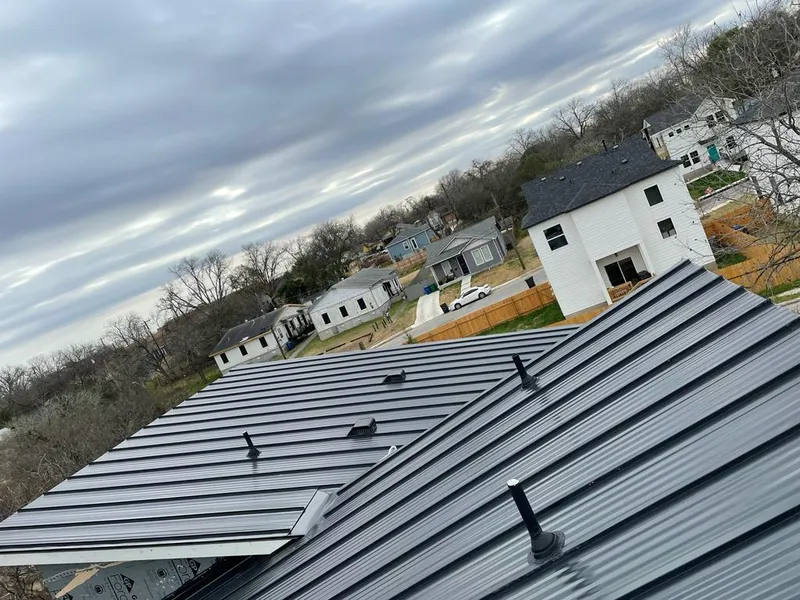Standing seam metal roof panels with vents for Skylight Repair in La Vista